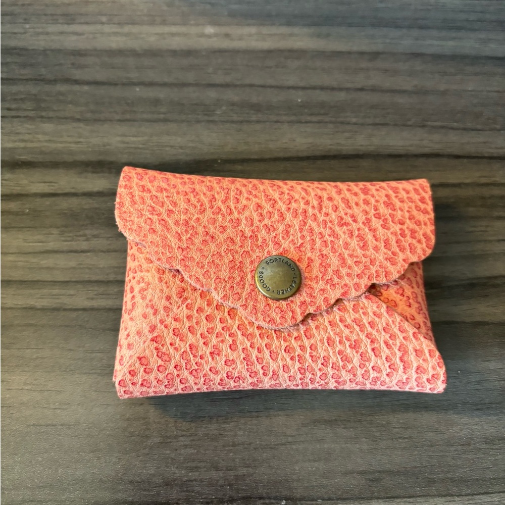 Portland Leather Mini Daisy Wallet. New, never used. Pink/salmon color.